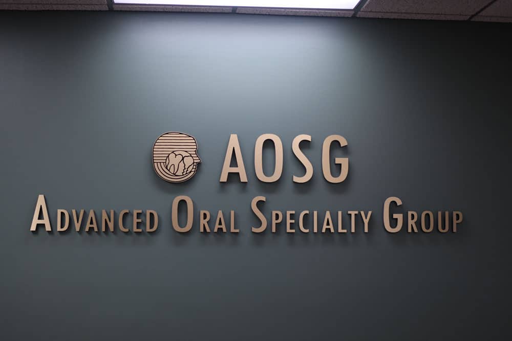 advanced oral specialty group logo