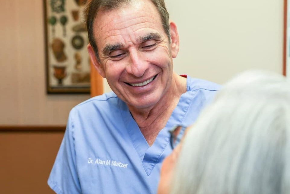 Dr Meltzer with a patient